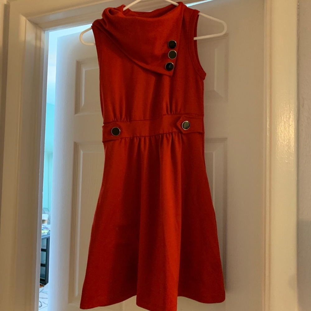 Red dress. I guess you could call it rockabilly.